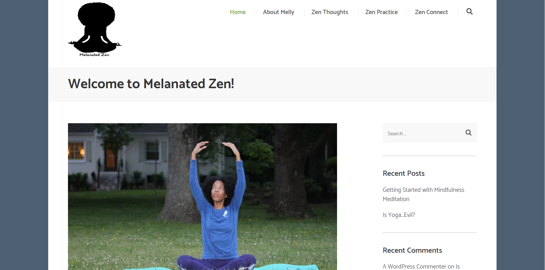 The home page for Melanated Zen. Melissa Dale sits on a yoga mat in her living room.